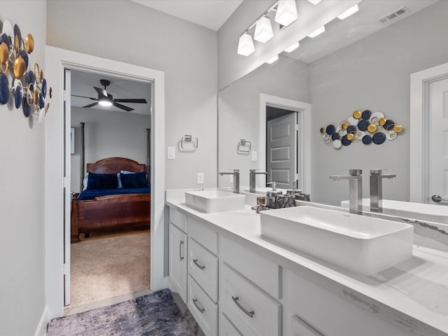 21310 Blue Wood Aster Ct, Cypress, TX 77433 - ensuite bathroom with double vanity and a ceiling fan