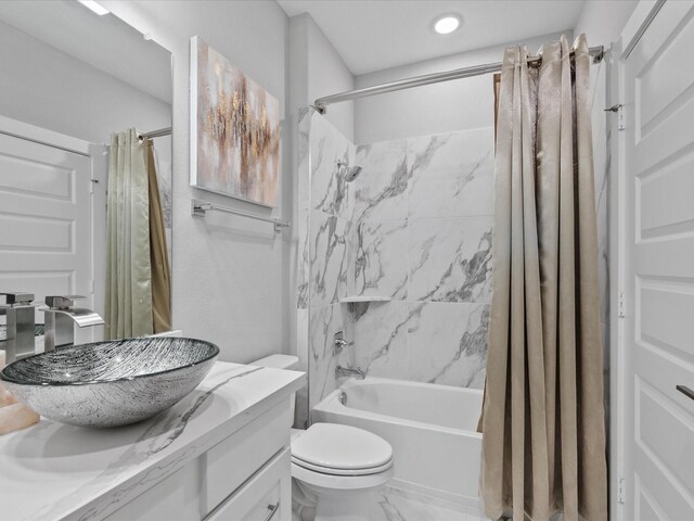21310 Blue Wood Aster Ct, Cypress, TX 77433 - full bathroom with shower / bath combo, vanity, and marble look tile flooring