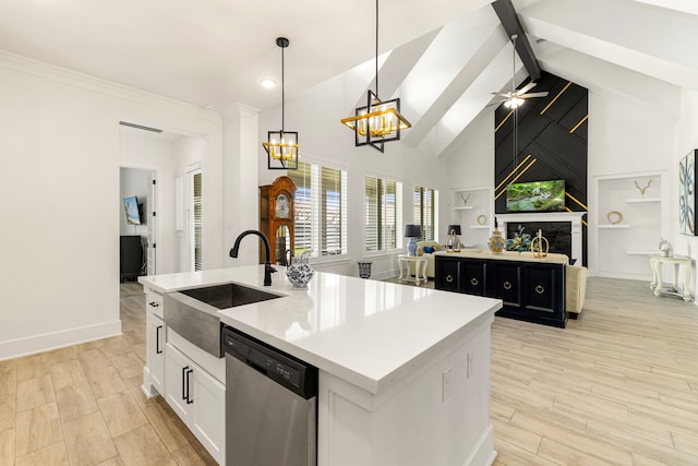 6523 Poplar Meadow Ln, Katy, TX 77493 - kitchen with dishwasher, an island with sink, open floor plan, light wood-style flooring, and white cabinetry