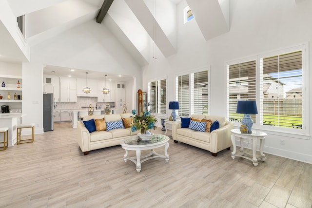 6523 Poplar Meadow Ln, Katy, TX 77493 - living room with high vaulted ceiling, beamed ceiling, light wood finished floors, and recessed lighting