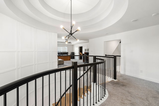 6523 Poplar Meadow Ln, Katy, TX 77493 - hallway featuring an upstairs landing, a chandelier, and light carpet