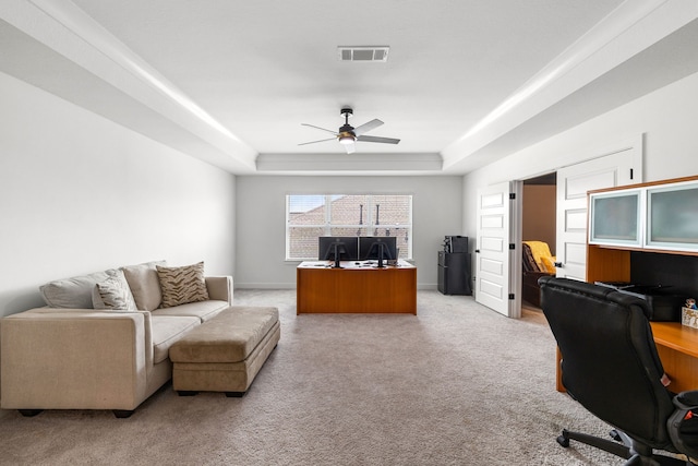 6523 Poplar Meadow Ln, Katy, TX 77493 - office featuring ceiling fan, a tray ceiling, and light carpet
