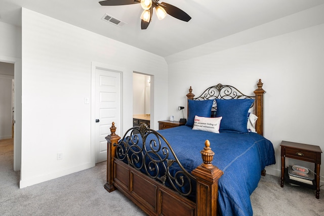 6523 Poplar Meadow Ln, Katy, TX 77493 - bedroom with light colored carpet, a ceiling fan, and ensuite bathroom