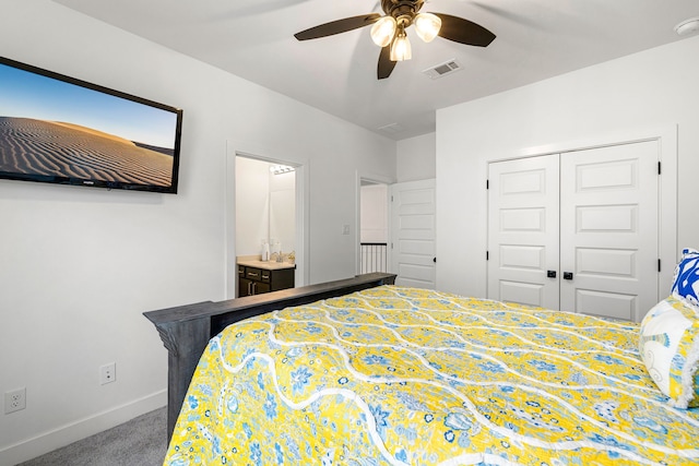 6523 Poplar Meadow Ln, Katy, TX 77493 - carpeted bedroom featuring a closet, ceiling fan, and ensuite bath