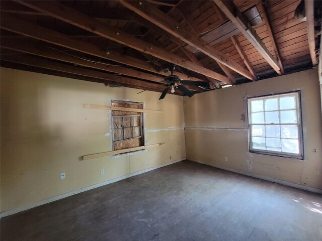 506 S Iowa St, La Porte, TX 77571 - unfurnished room with ceiling fan and a wood ceiling with exposed beams
