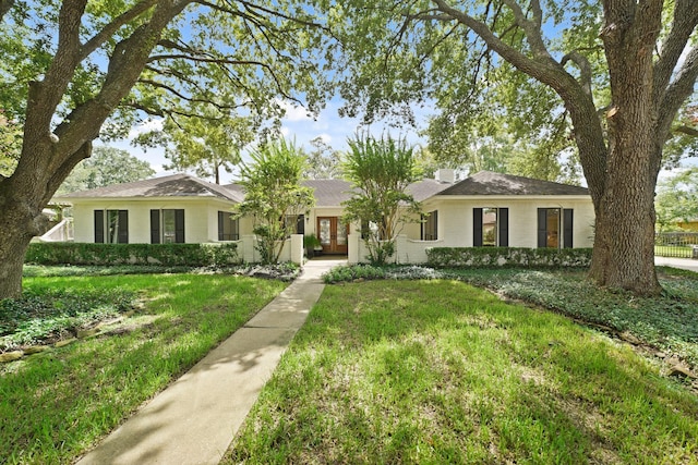 15722 Falmouth Dr, Houston, TX 77059 - ranch-style house with french doors and a front yard