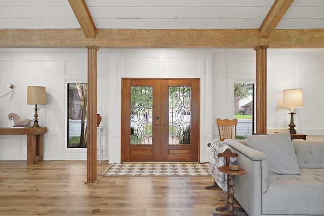 15722 Falmouth Dr, Houston, TX 77059 - entryway with beamed ceiling, french doors, and wood finished floors