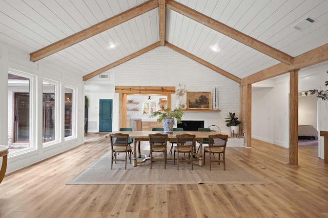 15722 Falmouth Dr, Houston, TX 77059 - dining space featuring wood finished floors and brick wall