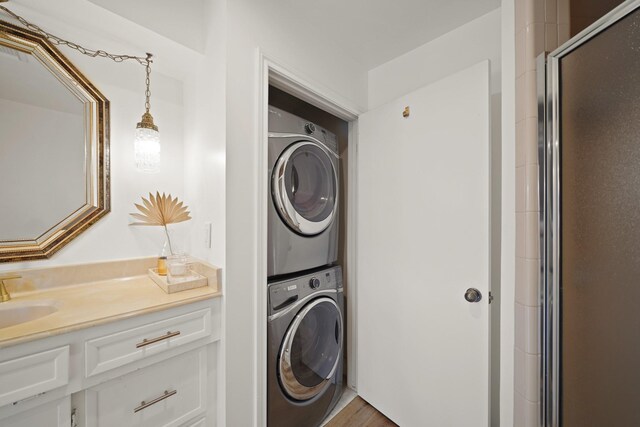 15722 Falmouth Dr, Houston, TX 77059 - laundry area with stacked washer / dryer