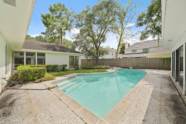 15722 Falmouth Dr, Houston, TX 77059 - view of swimming pool featuring a fenced backyard and a patio area