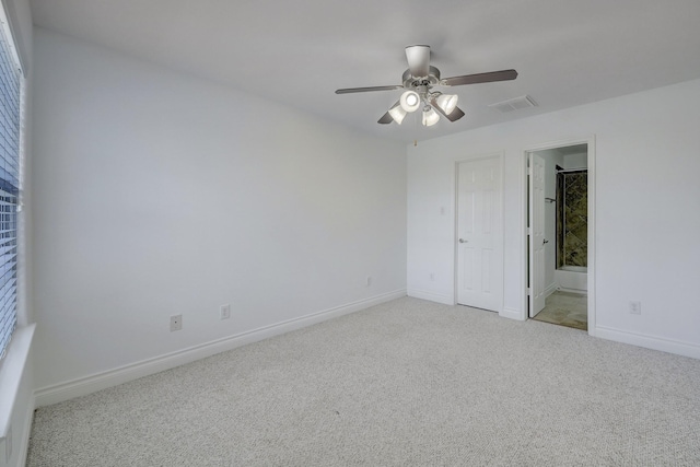 7539 Highmeadow, Houston, TX 77063 - unfurnished bedroom with light colored carpet, ensuite bathroom, and ceiling fan
