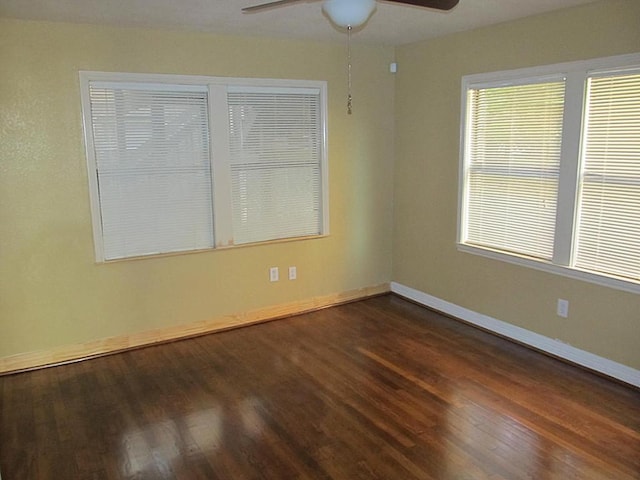 4911 Delano St, Houston, TX 77004 - spare room featuring a ceiling fan and wood finished floors