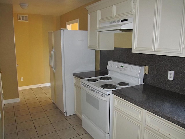 4911 Delano St, Houston, TX 77004 - kitchen featuring white electric range oven, under cabinet range hood, light tile patterned floors, tasteful backsplash, and dark countertops