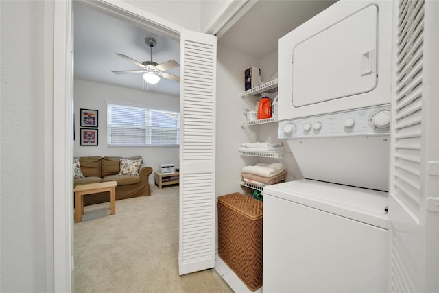 2002 Gentryside Dr Unit 117, Houston, TX 77077 - laundry room with stacked washer / drying machine, a ceiling fan, and light carpet