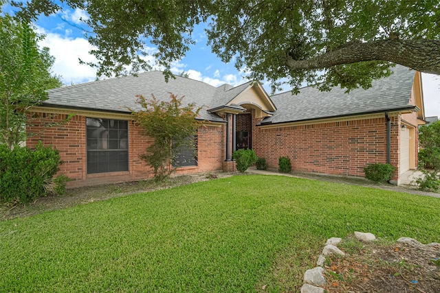 3803 Doveswood Cir, Needville, TX 77461 - ranch-style house featuring roof with shingles, a front lawn, and brick siding