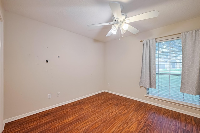 3803 Doveswood Cir, Needville, TX 77461 - unfurnished room with wood finished floors, ceiling fan, and a textured ceiling