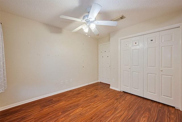 3803 Doveswood Cir, Needville, TX 77461 - unfurnished bedroom featuring wood finished floors, a closet, and ceiling fan