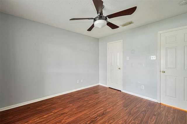 3803 Doveswood Cir, Needville, TX 77461 - unfurnished room featuring dark wood-type flooring, a ceiling fan, and a smoke detector
