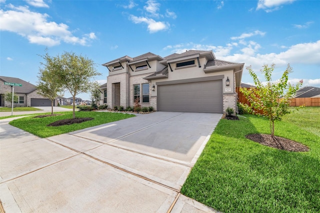 12722 Noble Fields Way, Cypress, TX 77433 - prairie-style home featuring driveway, stucco siding, and an attached garage