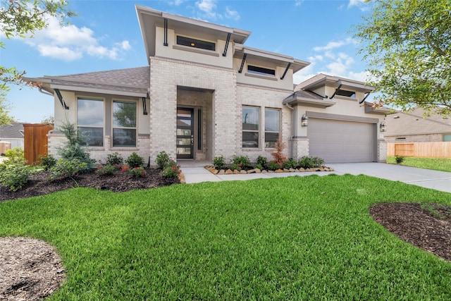 12722 Noble Fields Way, Cypress, TX 77433 - view of front facade with brick siding, concrete driveway, a garage, and stucco siding