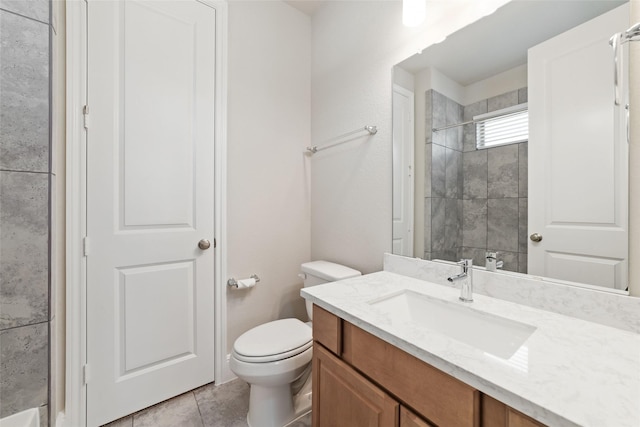 12722 Noble Fields Way, Cypress, TX 77433 - bathroom featuring vanity, tiled shower, and tile patterned flooring