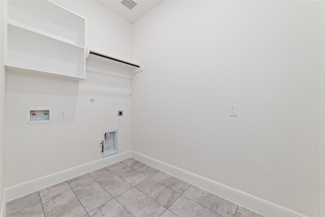 12722 Noble Fields Way, Cypress, TX 77433 - laundry area with hookup for a gas dryer, electric dryer hookup, hookup for a washing machine, and light tile patterned flooring