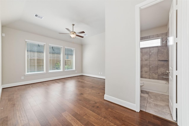 12722 Noble Fields Way, Cypress, TX 77433 - spare room featuring a ceiling fan and dark wood-style flooring