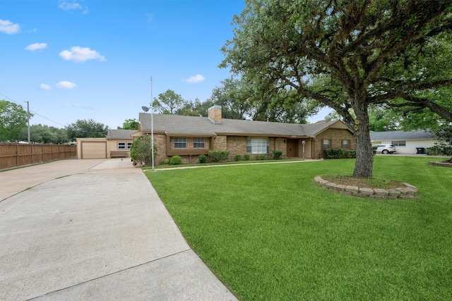 3101 Yost Blvd, Pearland, TX 77581 - ranch-style house featuring driveway, a chimney, and brick siding