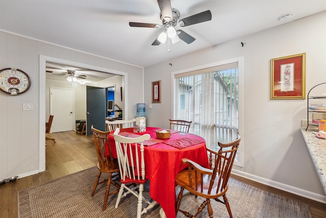 3101 Yost Blvd, Pearland, TX 77581 - dining space featuring a ceiling fan and wood finished floors