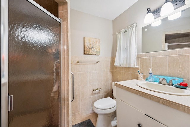3101 Yost Blvd, Pearland, TX 77581 - full bath featuring tile walls, vanity, a stall shower, tile patterned floors, and wainscoting