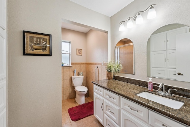 3101 Yost Blvd, Pearland, TX 77581 - full bathroom featuring vanity, tile patterned flooring, and tile walls