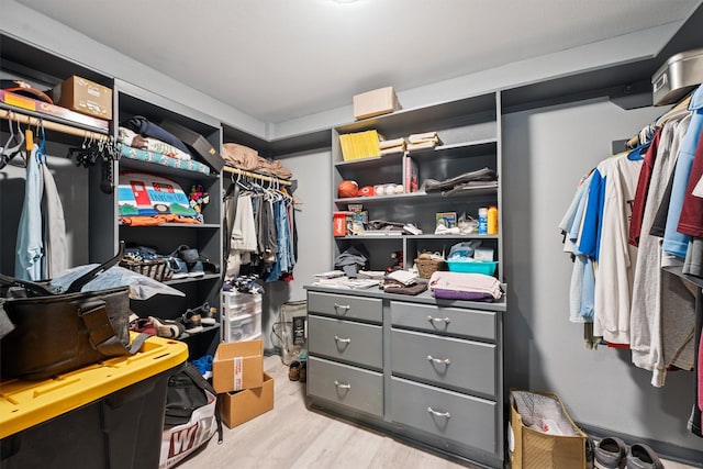 3101 Yost Blvd, Pearland, TX 77581 - walk in closet with light wood finished floors