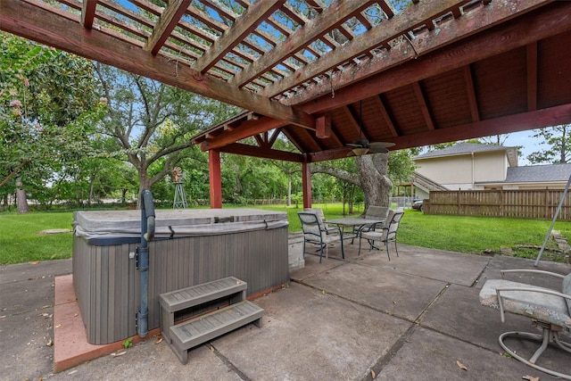 3101 Yost Blvd, Pearland, TX 77581 - view of patio / terrace with a hot tub, ceiling fan, outdoor dining space, and a pergola
