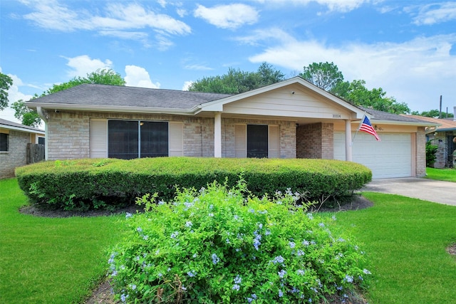 10314 Paintbrush Ln, Sugar Land, TX 77498 - single story home featuring a front lawn, driveway, a garage, and stone siding