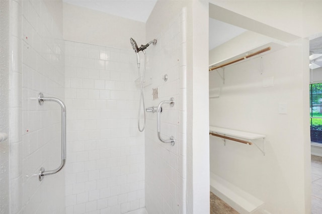 10314 Paintbrush Ln, Sugar Land, TX 77498 - bathroom with a tile shower and a walk in closet