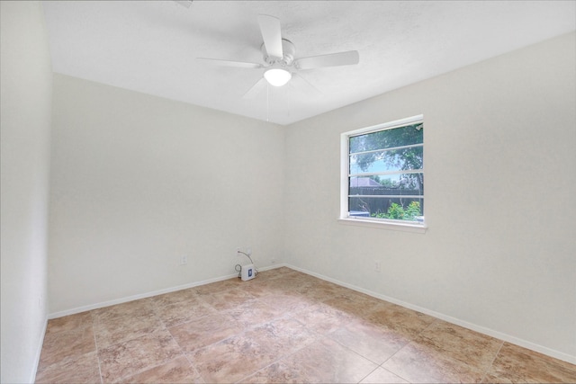 10314 Paintbrush Ln, Sugar Land, TX 77498 - empty room featuring a ceiling fan and baseboards