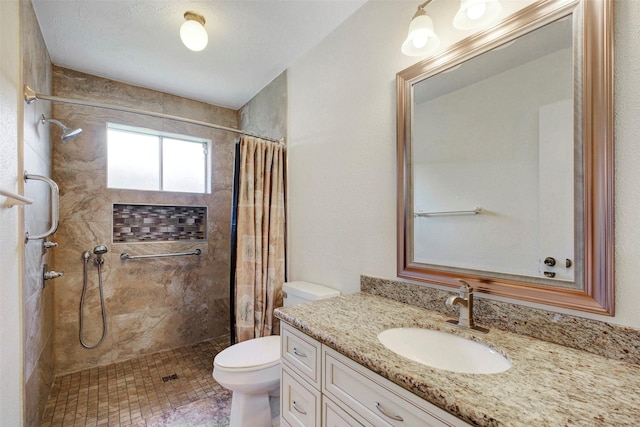 10314 Paintbrush Ln, Sugar Land, TX 77498 - bathroom featuring vanity and tiled shower