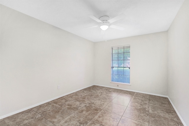 10314 Paintbrush Ln, Sugar Land, TX 77498 - tiled spare room featuring ceiling fan and baseboards