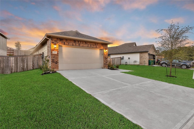 6609 Lahna Oak Dr, Conroe, TX 77304 - ranch-style house featuring brick siding, driveway, and an attached garage