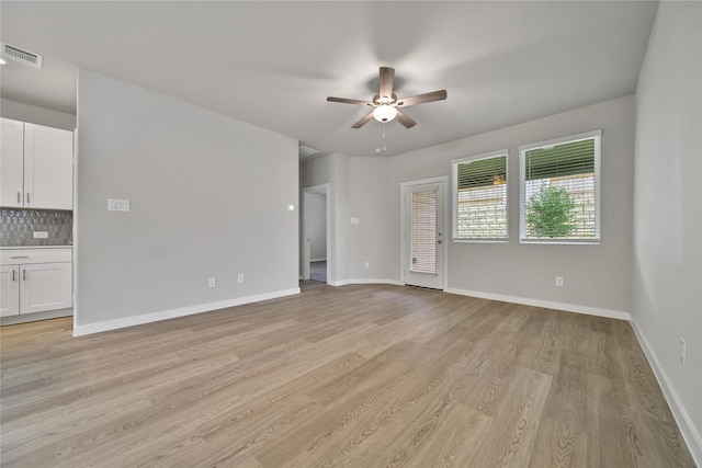 6609 Lahna Oak Dr, Conroe, TX 77304 - unfurnished room featuring a ceiling fan and light wood finished floors