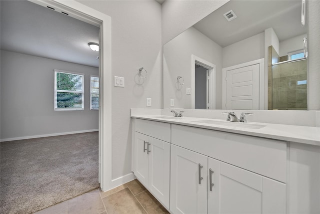 6609 Lahna Oak Dr, Conroe, TX 77304 - full bath featuring double vanity and a shower stall