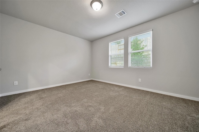 6609 Lahna Oak Dr, Conroe, TX 77304 - spare room with carpet