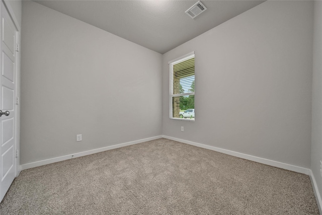 6609 Lahna Oak Dr, Conroe, TX 77304 - carpeted spare room with vaulted ceiling and baseboards
