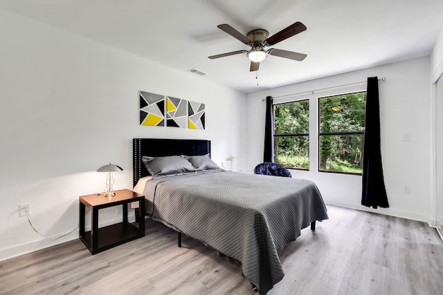 118 Hickory Pnes, Livingston, TX 77351 - bedroom with light wood-style floors and a ceiling fan
