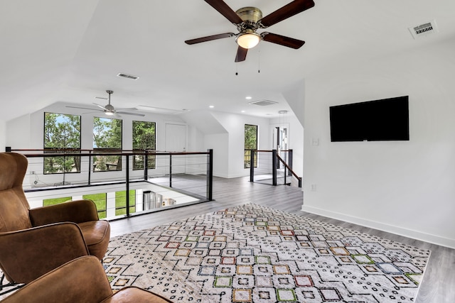 118 Hickory Pnes, Livingston, TX 77351 - living area with ceiling fan, plenty of natural light, wood finished floors, vaulted ceiling, and recessed lighting