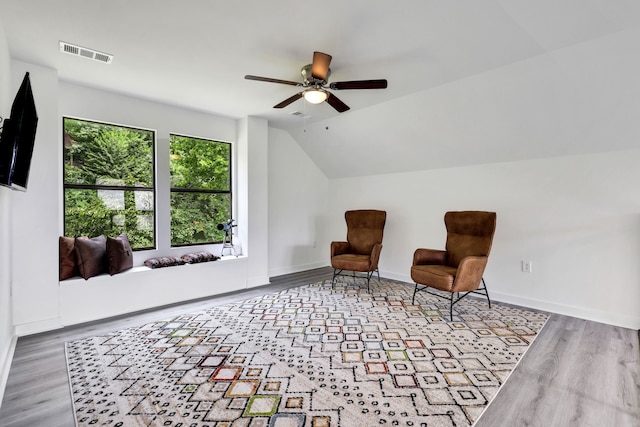 118 Hickory Pnes, Livingston, TX 77351 - sitting room featuring a ceiling fan, wood finished floors, and lofted ceiling