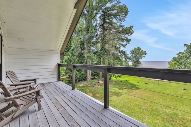 118 Hickory Pnes, Livingston, TX 77351 - wooden terrace featuring a water view and a lawn
