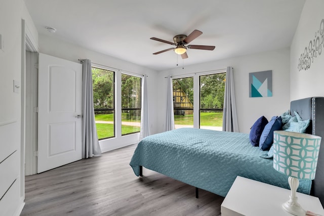 118 Hickory Pnes, Livingston, TX 77351 - bedroom featuring wood finished floors and ceiling fan