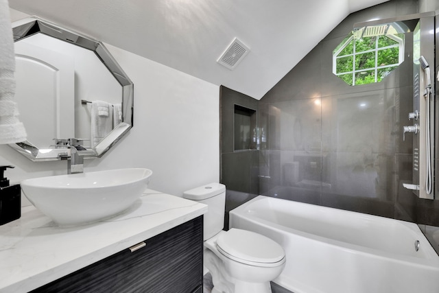 118 Hickory Pnes, Livingston, TX 77351 - full bathroom featuring vaulted ceiling, vanity, and bathtub / shower combination