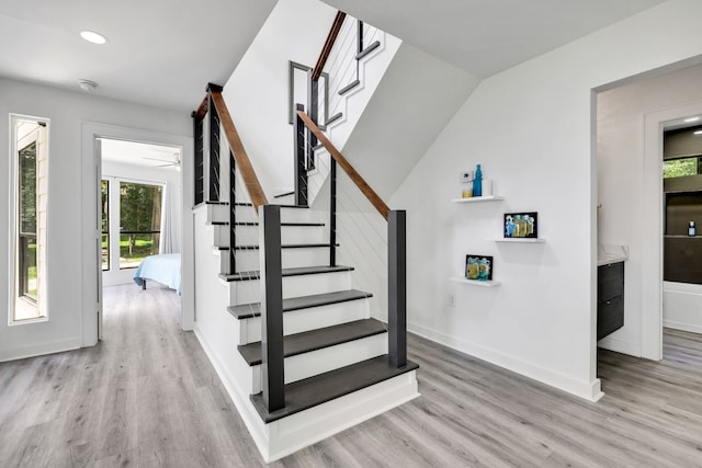 118 Hickory Pnes, Livingston, TX 77351 - staircase with wood finished floors, recessed lighting, and ceiling fan